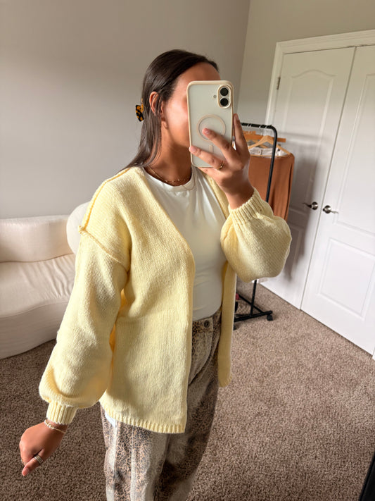 yellow cardigan